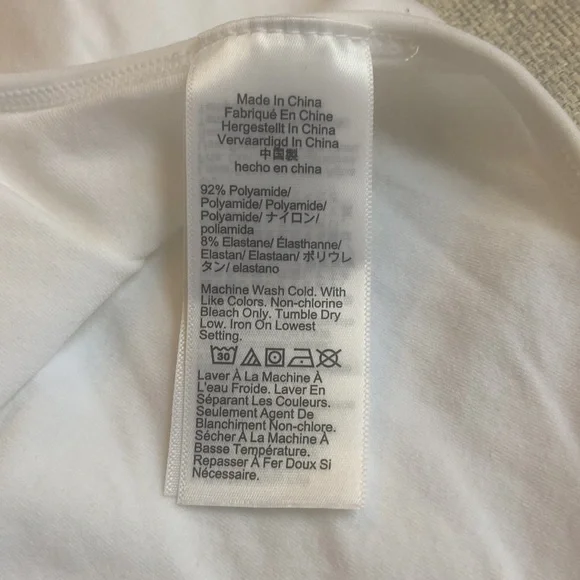 NWOT Sleeveless layering V-neck bodysuit - Picture 4 of 4